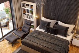 A Spacious Bedroom With A Modular TV Unit